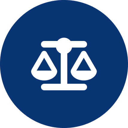 White justice scales icon on blue circle